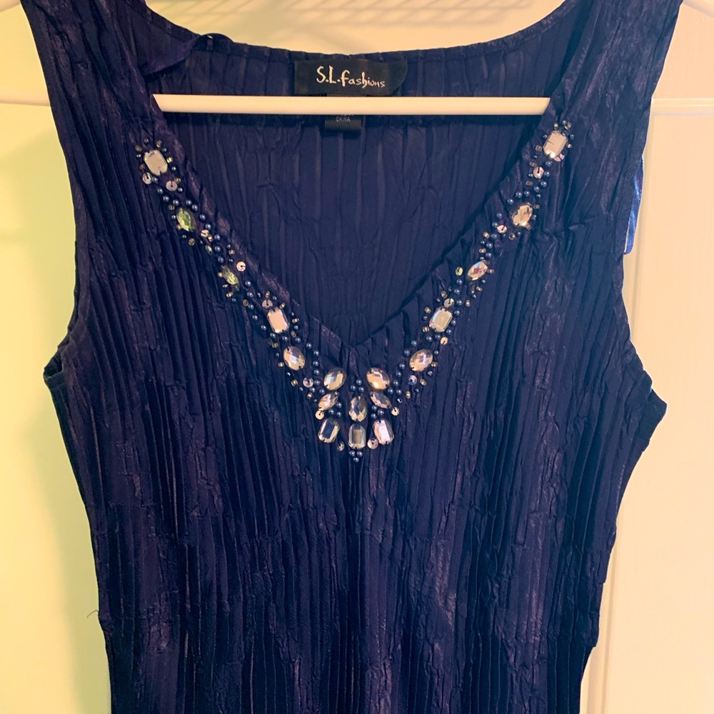 Navy blue Dressy sleeveless midi length dress and lightweight jacket.Embellished